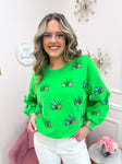 QOS Lime Green Easter Egg In Grass Sweatshirt